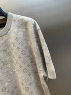 Monogram knit T-shirt sleeve and shoulder detail in light beige