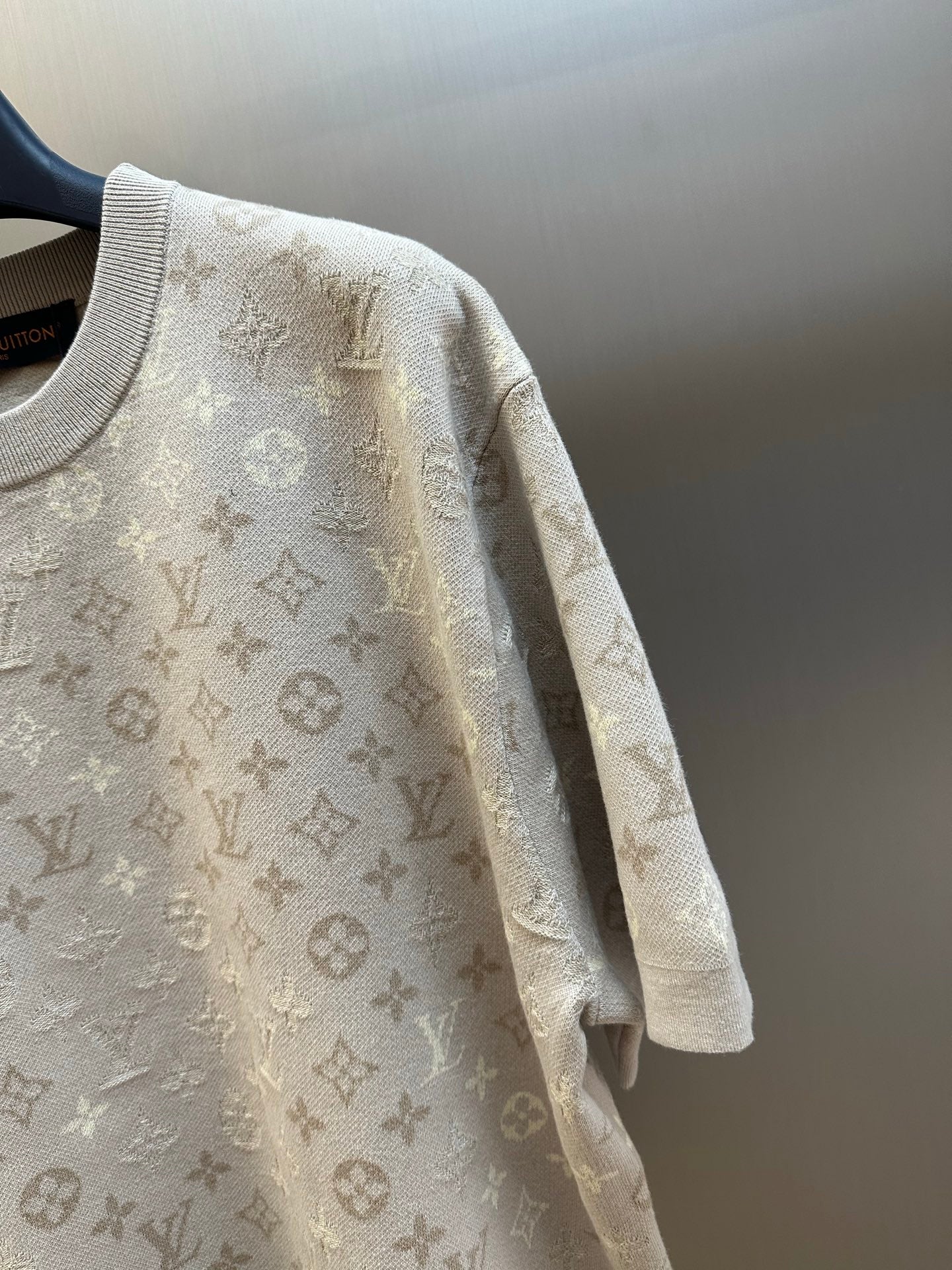 Monogram knit T-shirt sleeve and shoulder detail in light beige