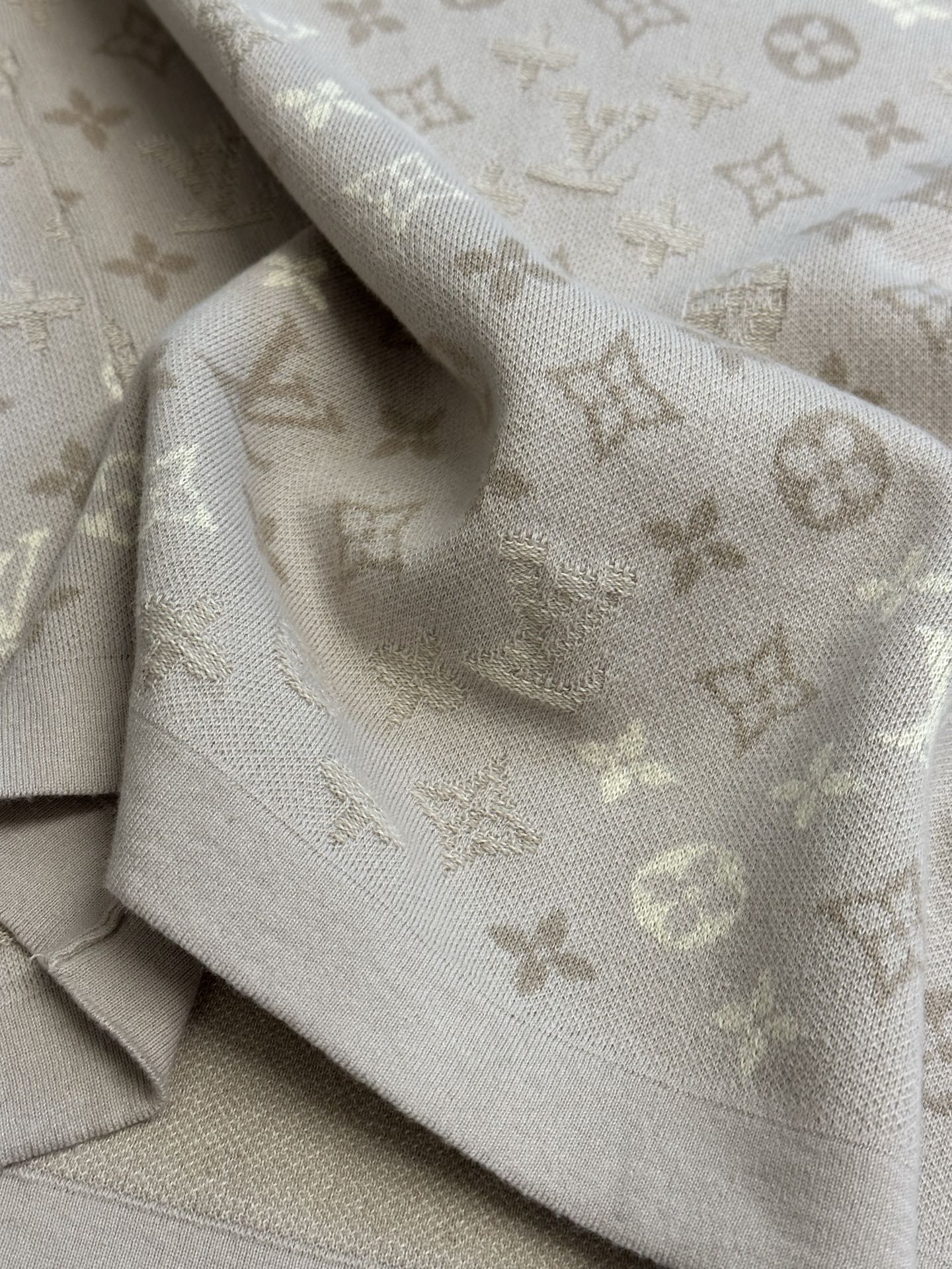 Monogram knit T-shirt shoulder and sleeve detail in light beige
