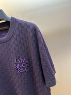 Louis Vuitton short-sleeve T-shirt detail with dark purple checker knit and chest logo