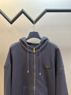 Dark navy zip-up hoodie with hood, chest pocket, and Louis Vuitton Paris patch