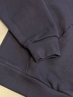 Dark navy hoodie sleeve cuff and hem with ribbed trim