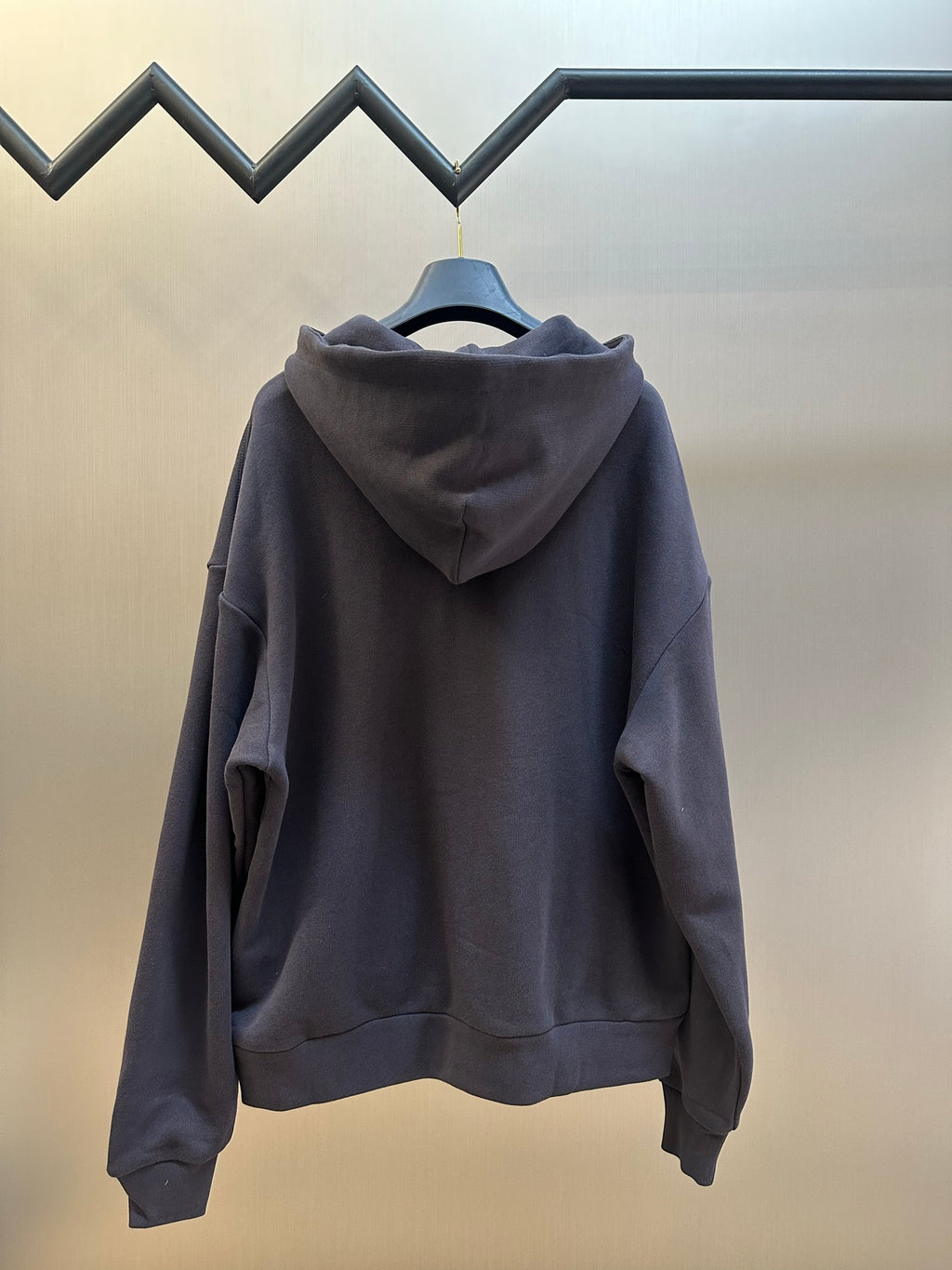 Dark navy zip-up hoodie back view with attached hood