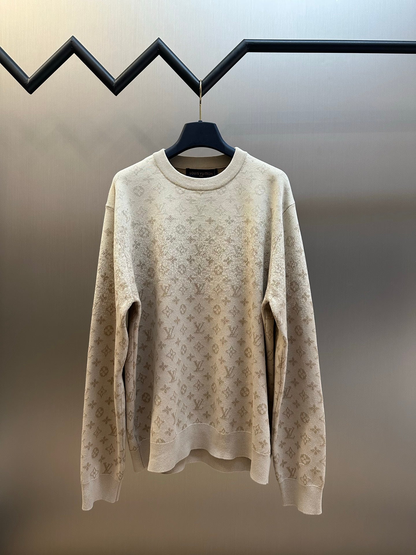 Light beige crewneck sweater with all-over Louis Vuitton monogram pattern