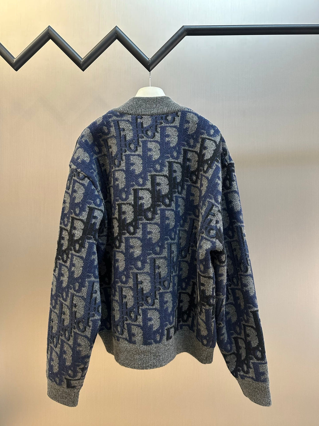 Logo knit zip jacket, blue and gray, back view with full zipper