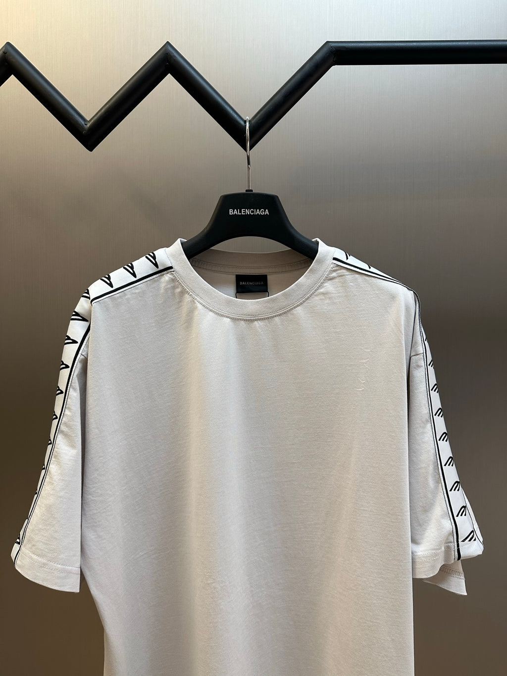 White crewneck T-shirt front view with short sleeves and logo stripe detailing
