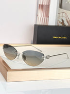 Balenciaga sunglasses with dark lenses and black frame, metal link on bridge