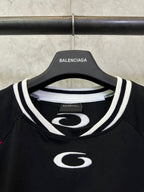 Balenciaga short-sleeve jersey neckline with white striped collar and oval logo patch