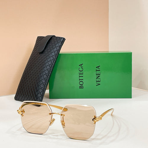 Bottega Veneta sunglasses with gold-tone frame and light tinted lenses