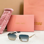 MiuMiu gold-tone rectangular sunglasses with blue gradient lenses and black top detail