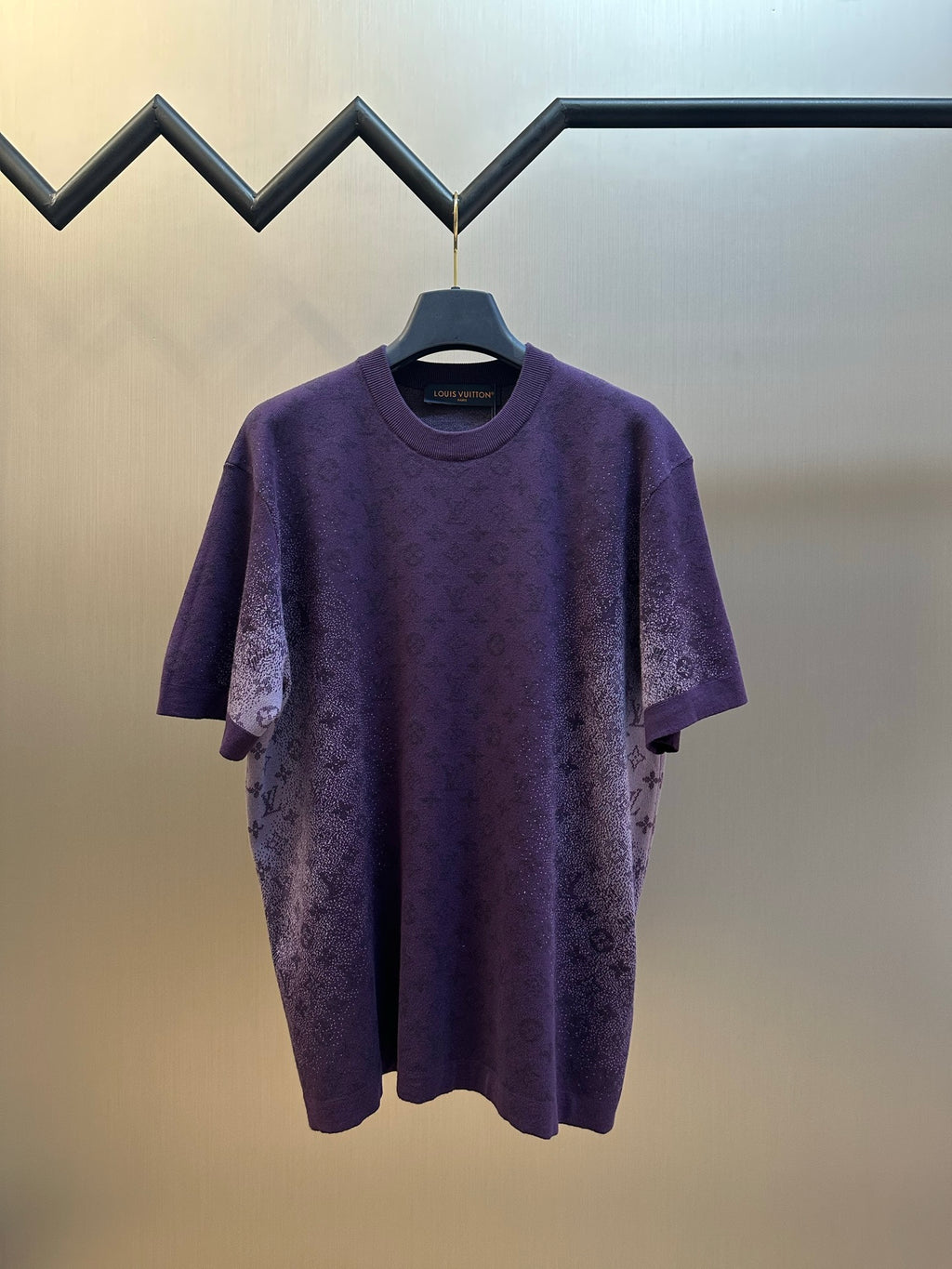 Purple short-sleeve crewneck T-shirt with textured graphic print, front view