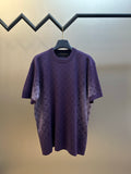 Purple short-sleeve crewneck T-shirt with textured graphic print, front view