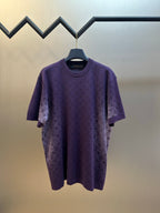 Purple short-sleeve crewneck T-shirt with textured graphic print, front view