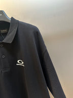 Balenciaga dark polo shirt, ribbed collar and chest logo, button placket