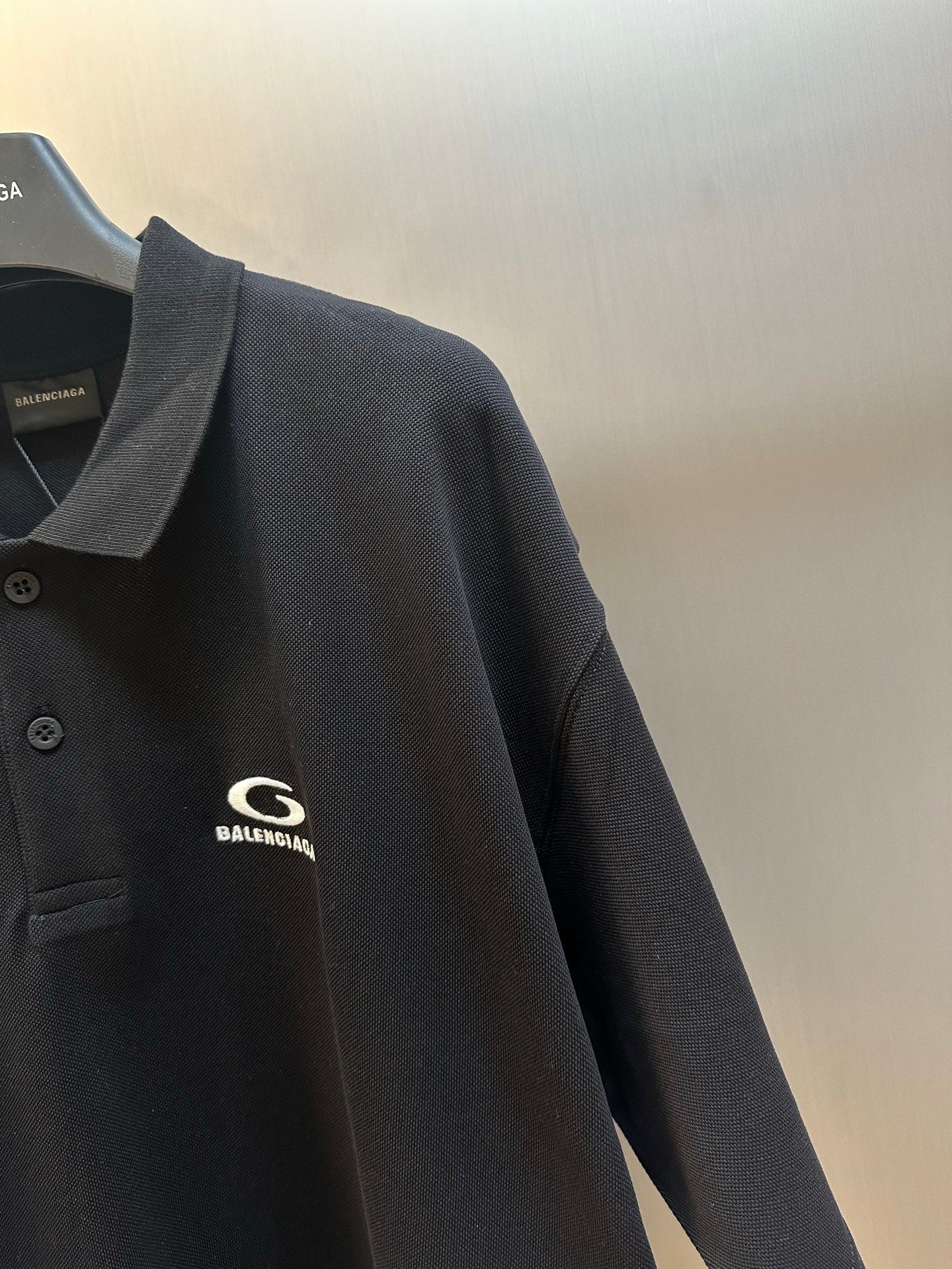 Balenciaga dark polo shirt, ribbed collar and chest logo, button placket