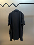 Balenciaga dark polo shirt, short sleeves, back view