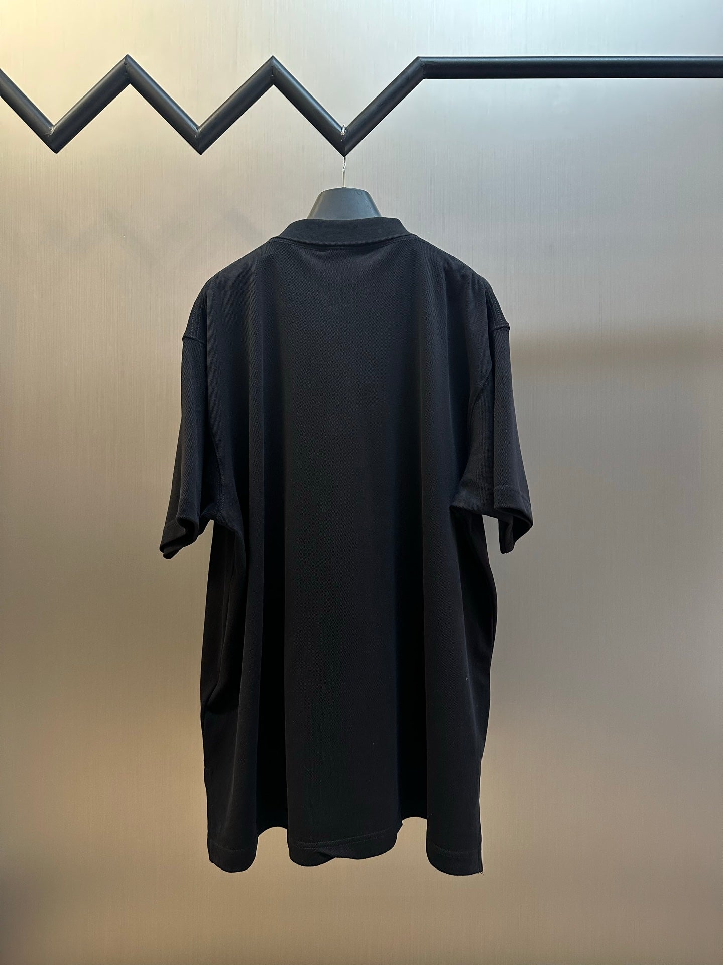 Balenciaga dark polo shirt, short sleeves, back view