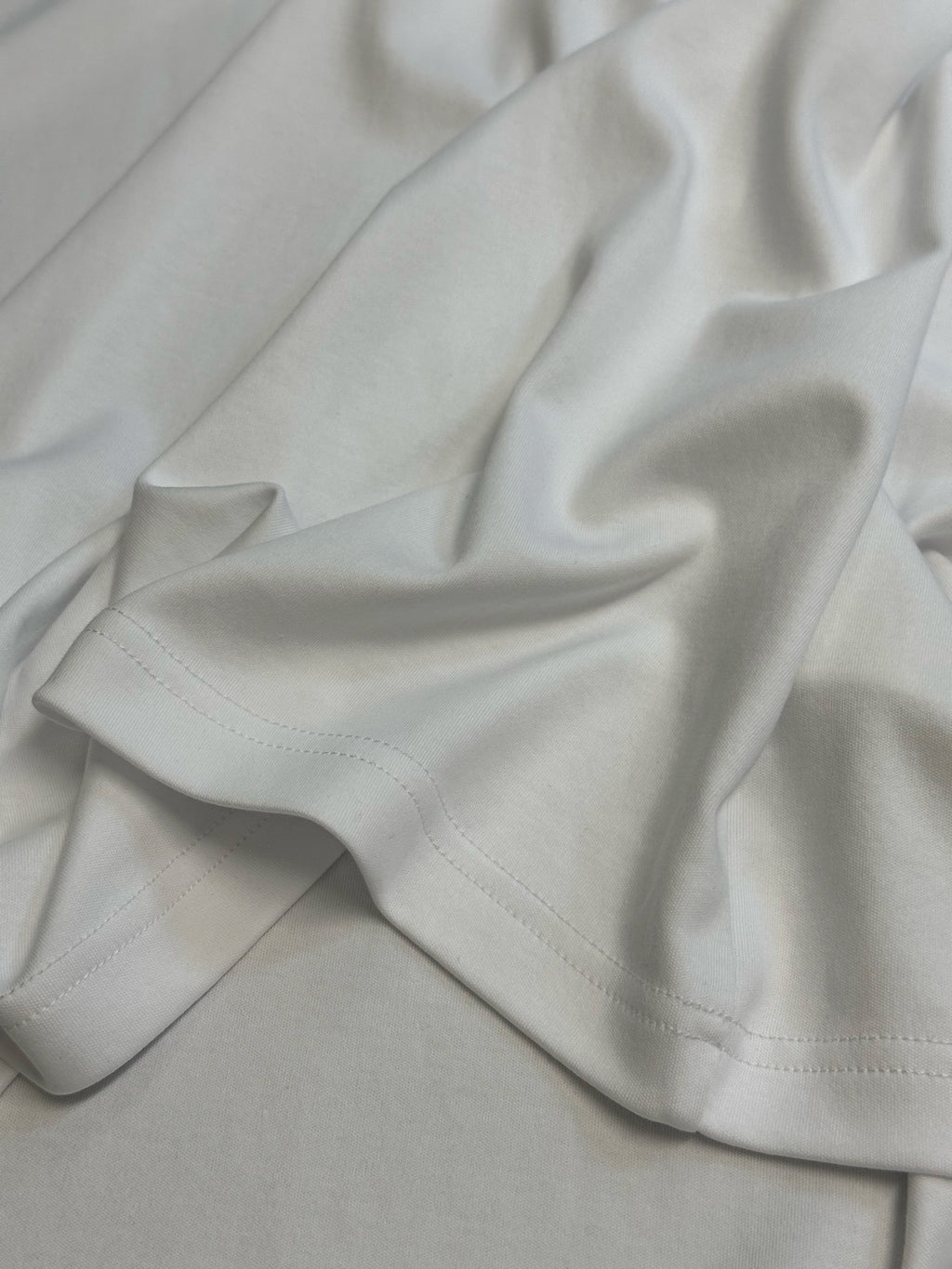 White T-shirt fabric and stitched hem with short sleeve