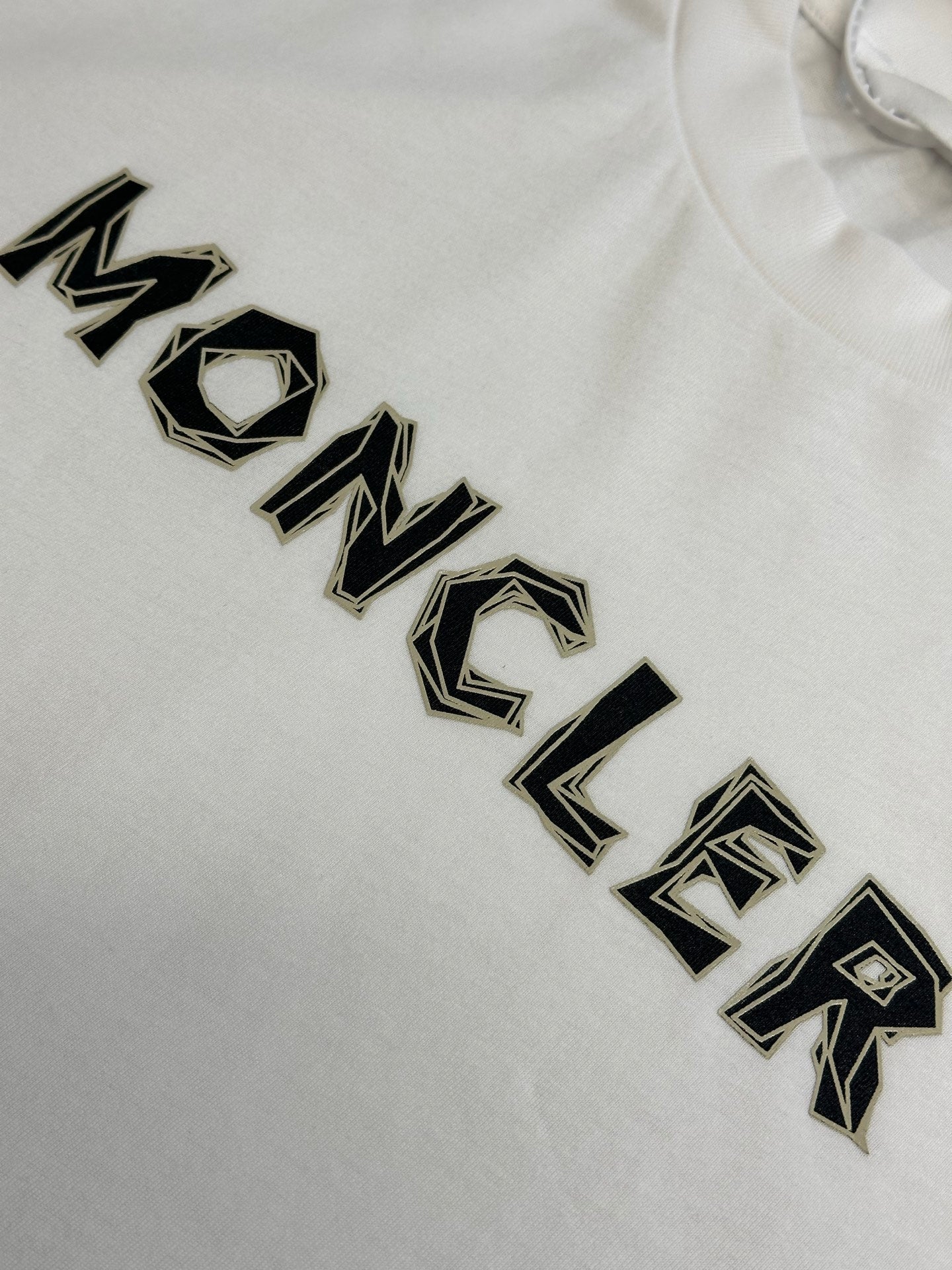 White T-shirt with embroidered black MONCLER lettering detail