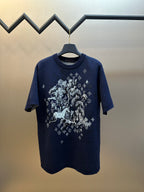 Navy short-sleeve T-shirt with large white graphic on front