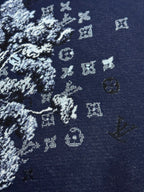 Navy knit T-shirt fabric close-up with white graphic pattern