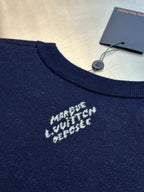 Navy T-shirt chest with small centered white motif