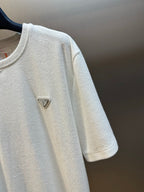 Prada short-sleeve T-shirt with small triangular Prada logo on chest