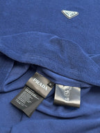 Blue Prada T-shirt hem with interior label and draped collar.