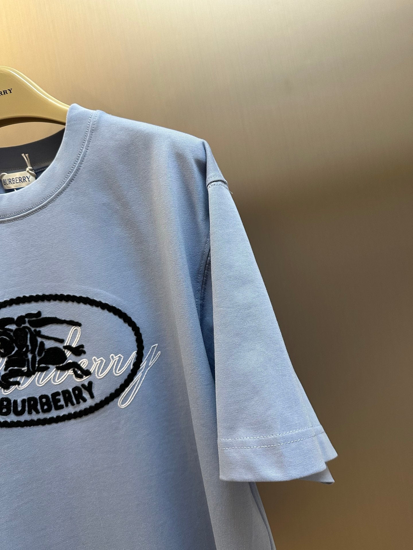 Light blue Burberry T-shirt sleeve and chest logo detail