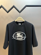 Black short-sleeve T-shirt with white Burberry oval logo, crew neck