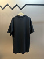 Black crew-neck T-shirt with short sleeves, back view