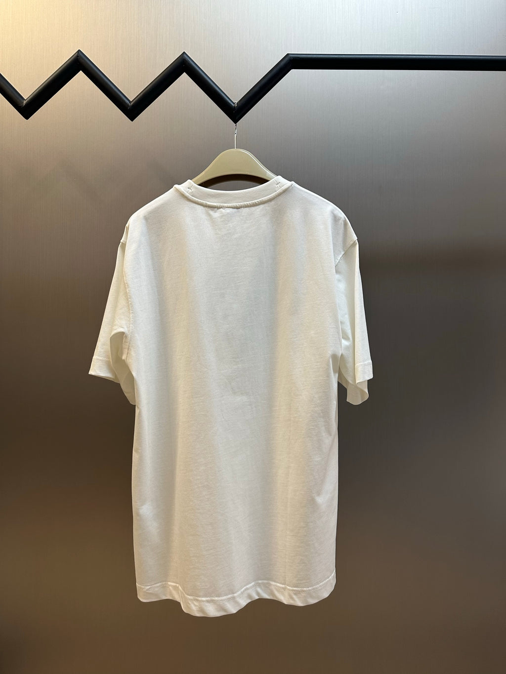 White Burberry T-shirt on hanger, crew neck, short sleeves, no visible front graphic