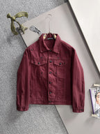 Maroon long-sleeve denim jacket on hanger, point collar, snap buttons, chest and pocket seams