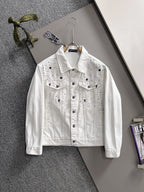 White denim jacket with black star-and-dot embroidery, button front, chest flap pockets