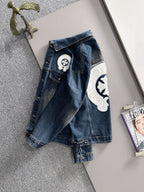 Blue long denim jacket back view with white pearl emblem and chest patch