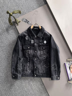 Dark denim jacket with button front, flap pockets, and embroidered distressed designs