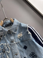Light blue denim jacket with embroidered chest details and dark navy side stripe panels