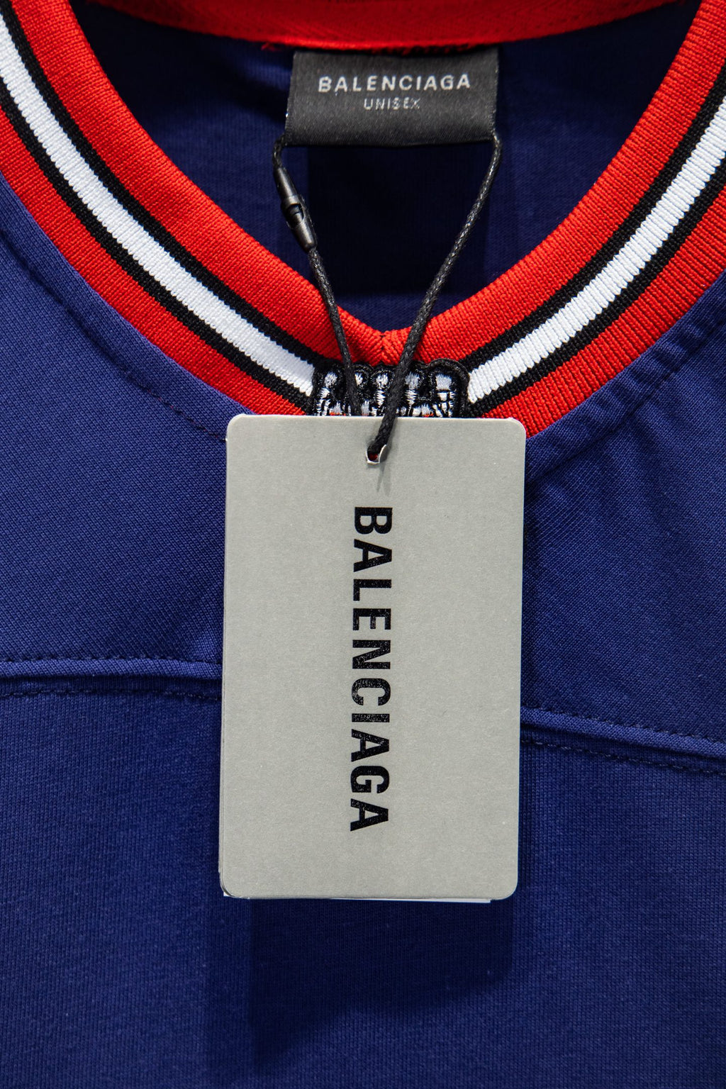 Balenciaga blue short-sleeve shirt collar with hanging brand tag and red trim