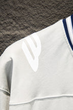 Balenciaga white T-shirt shoulder panel detail with partial blue rib trim