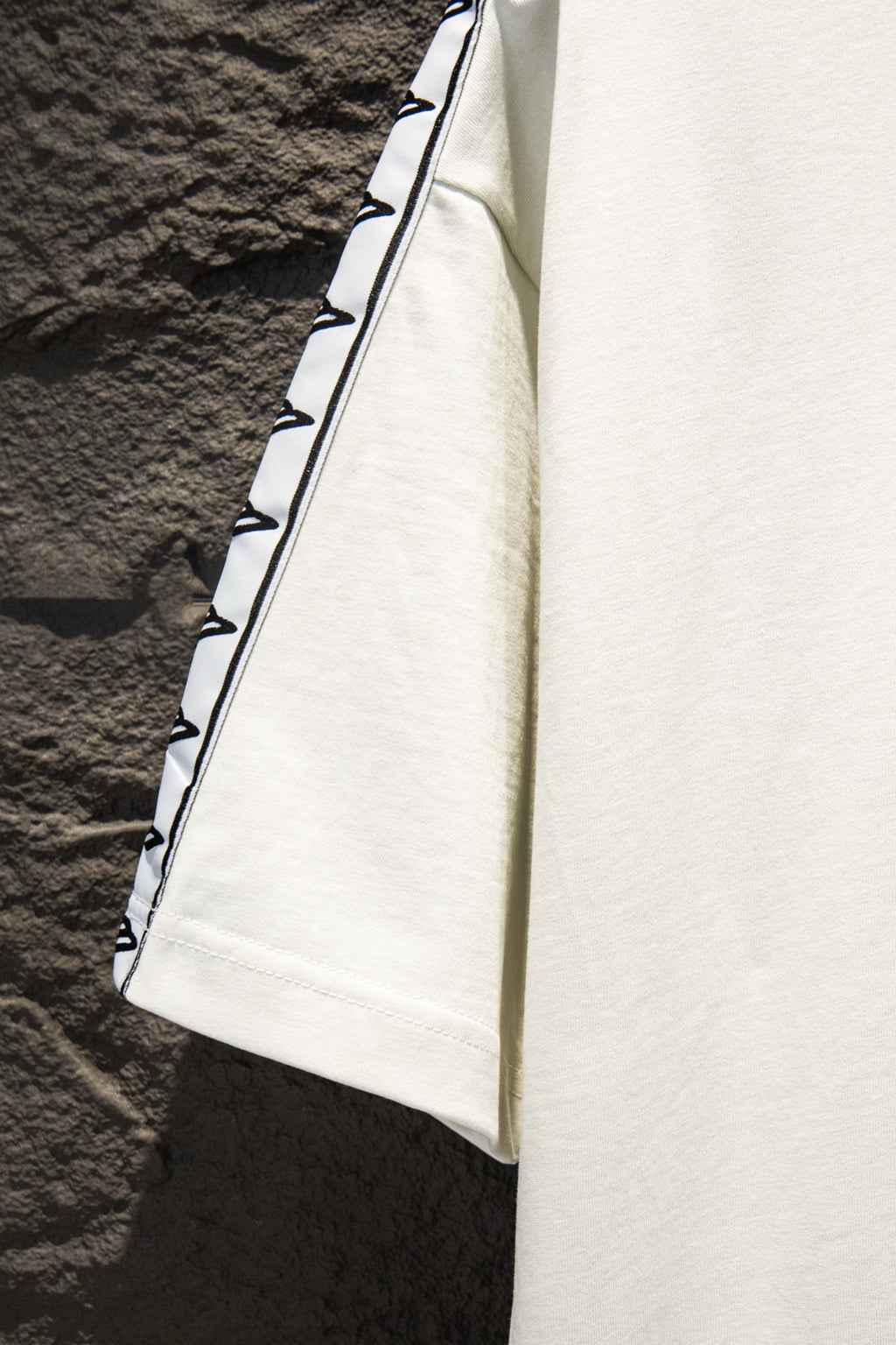 Balenciaga T-shirt, white side profile with striped sleeve panel detail
