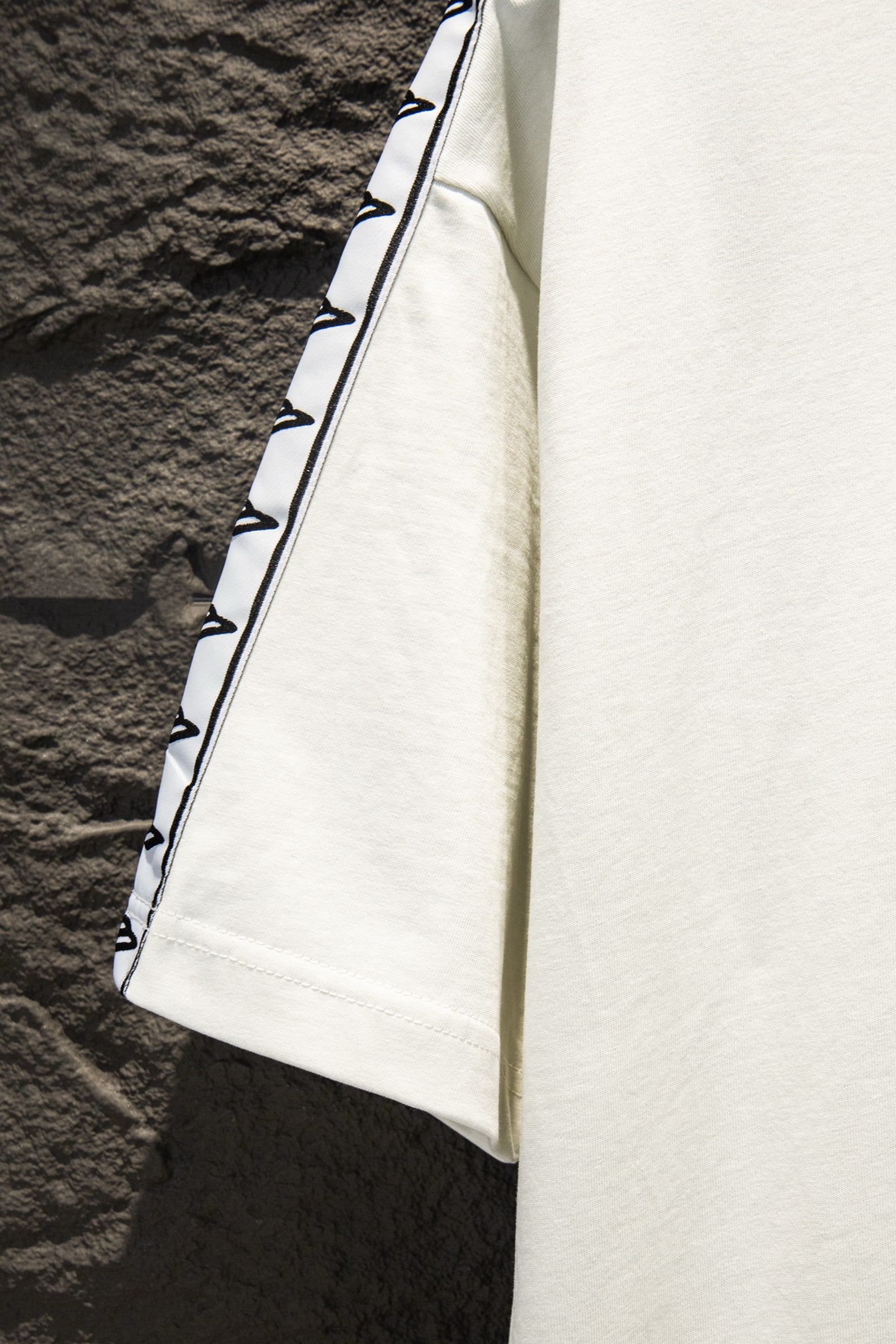 Balenciaga T-shirt, white side profile with striped sleeve panel detail