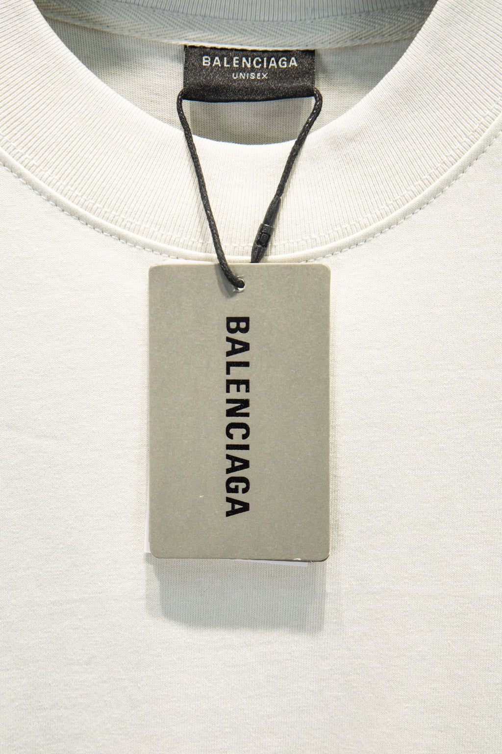 Balenciaga T-shirt neck tag, gray hang tag with brand label
