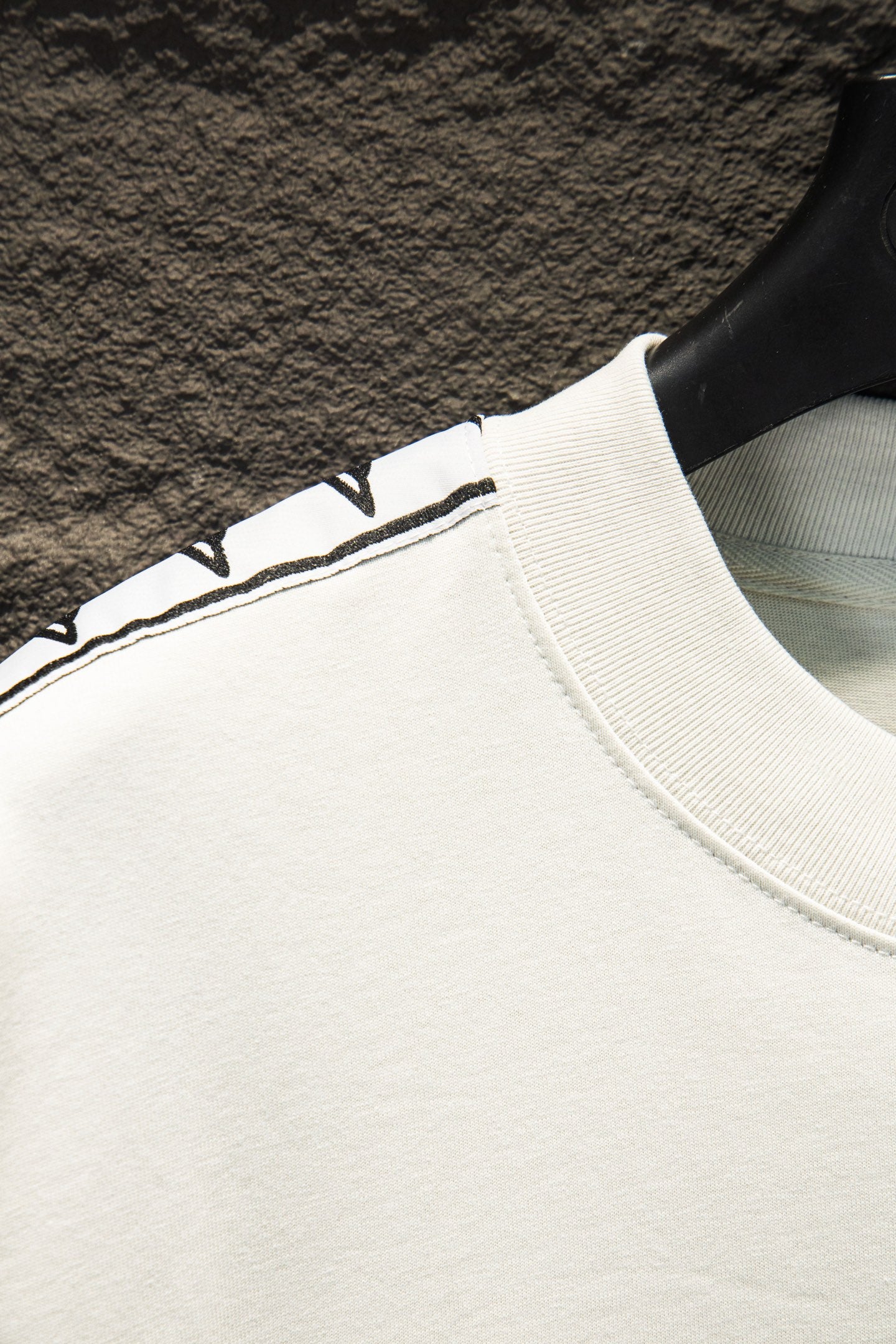 Balenciaga T-shirt sleeve trim, white fabric with black-and-blue striped band