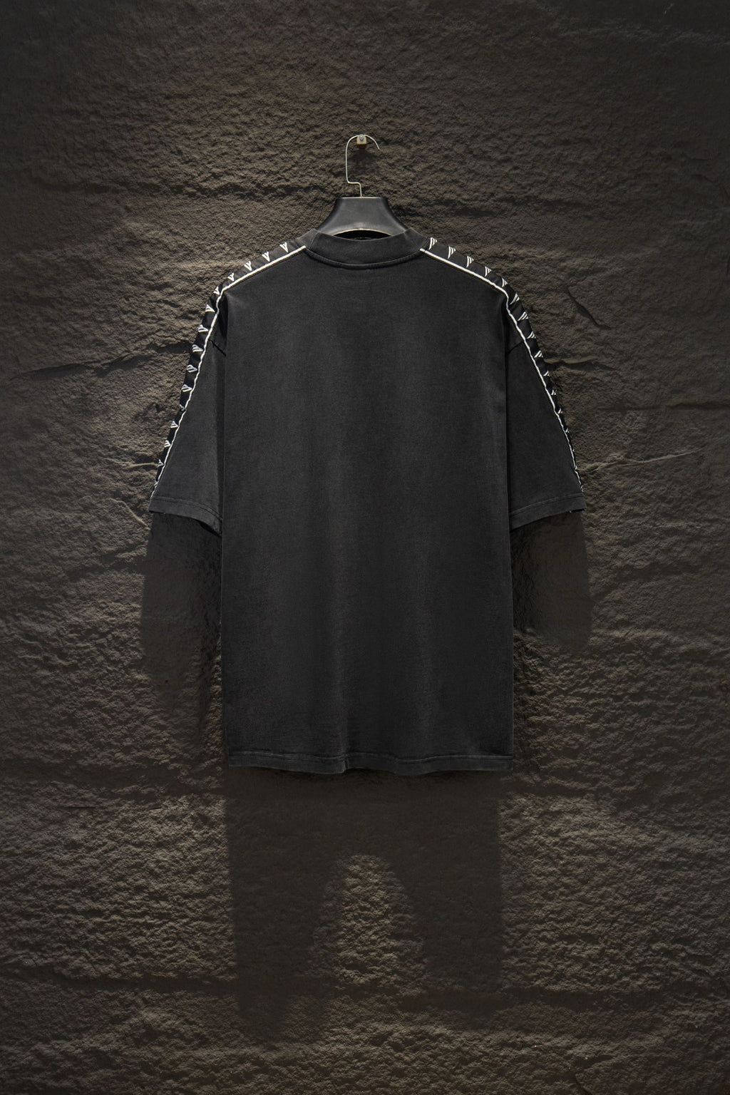 Balenciaga black crew-neck T-shirt with white logo tape on shoulders and sleeves