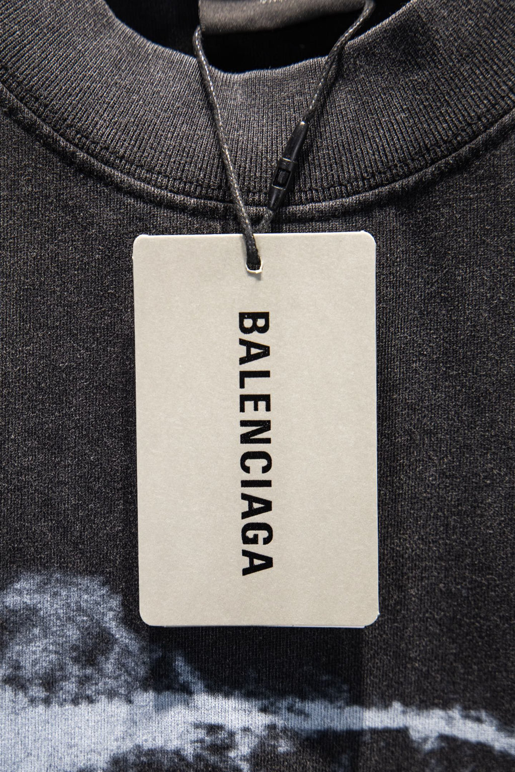 Balenciaga hang tag on dark gray crewneck T-shirt