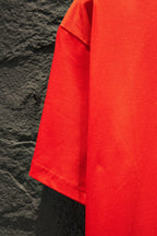 Balenciaga bright red T-shirt shoulder and sleeve seam detail