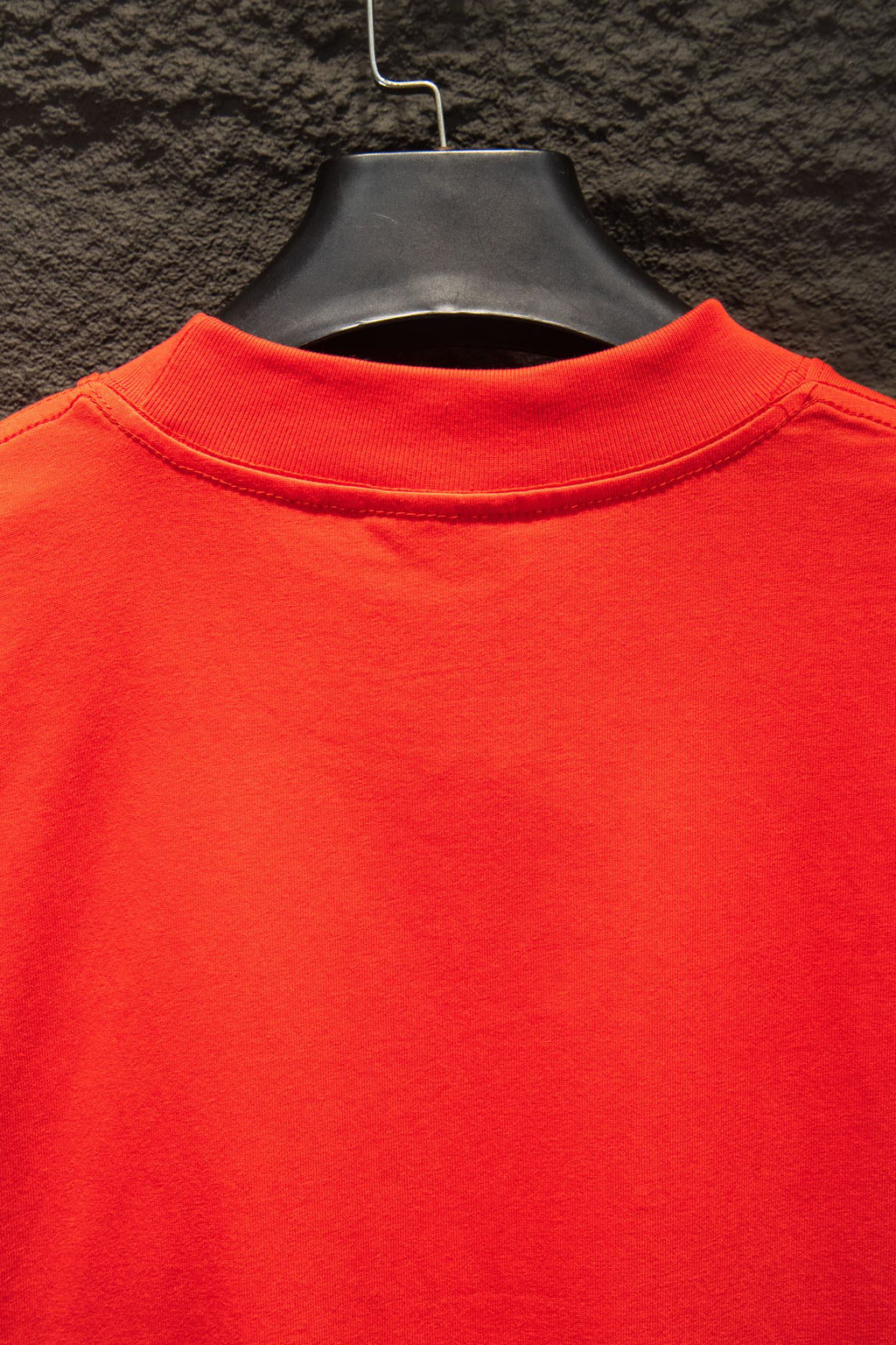 Balenciaga crew-neck T-shirt collar close-up in bright red