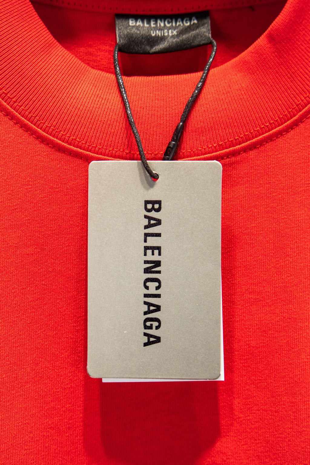 Balenciaga T-shirt collar and hanging tag with BALENCIAGA text