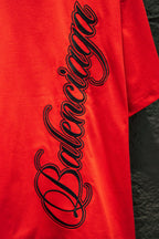 Balenciaga crew-neck T-shirt in bright red with black stylized script logo