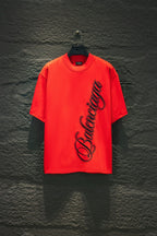 Balenciaga crew-neck T-shirt in bright red with black script logo graphic on front
